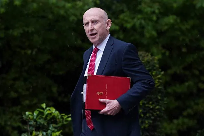 UK defense secretary quits, says government isn't willing to spend enough on military
