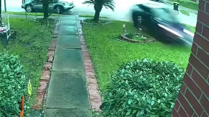 Surveillance video shows Tesla flying through Katy neighborhood before slamming into home, killing 76-year-old woman
