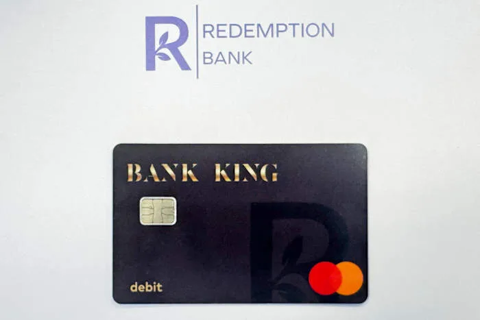 Black bank card program to steer cash payments to single mothers in government housing
