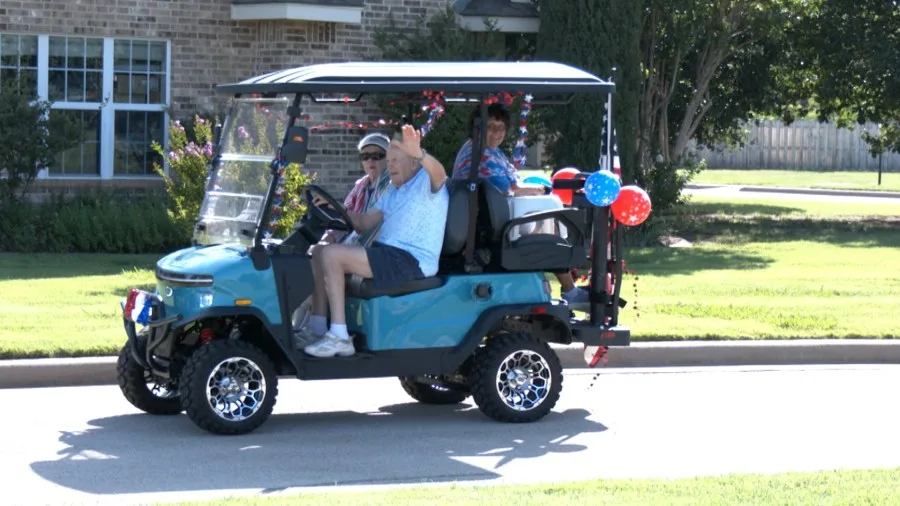 Abilene resident celebrates 106th birthday with golf cart parade