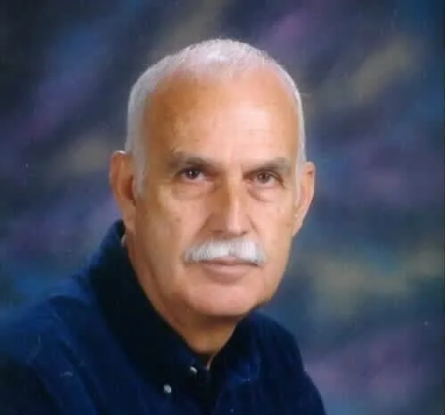 Charles "Coach" Brewster