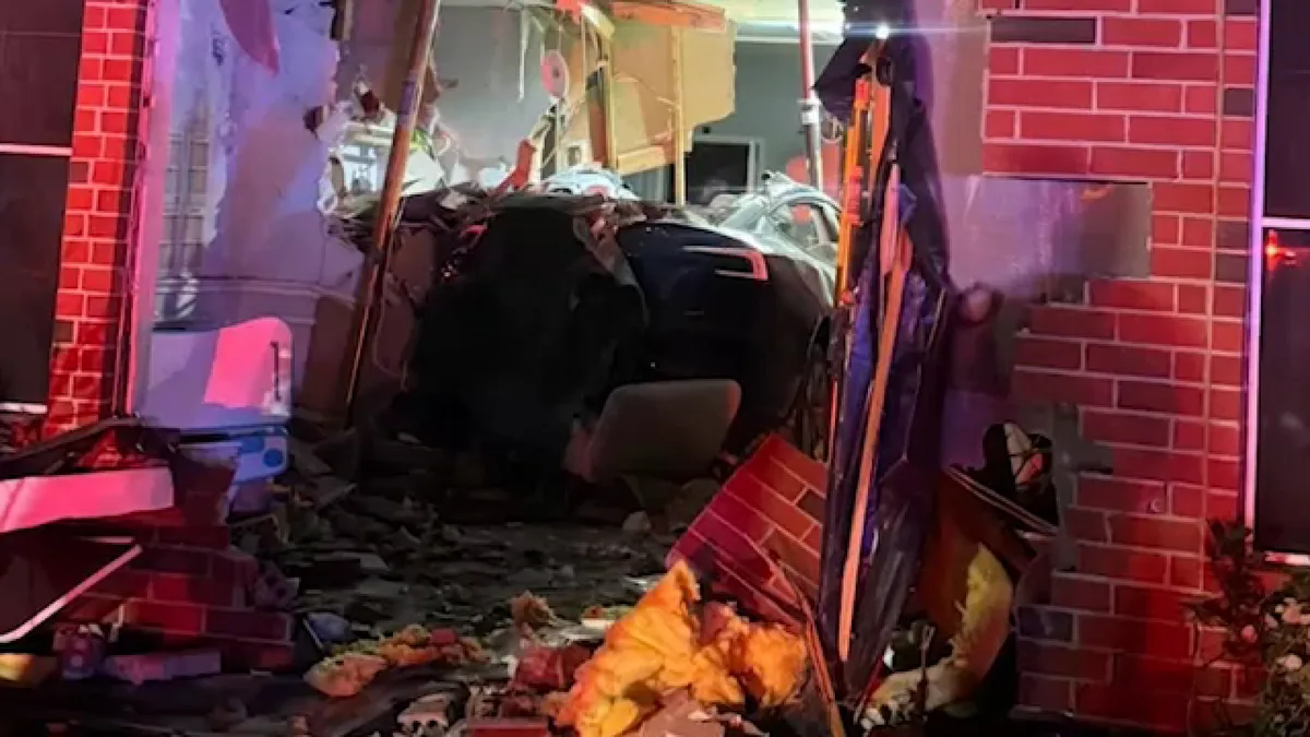 Woman killed, driver injured after Tesla crashes through Katy-area home, HCSO says
