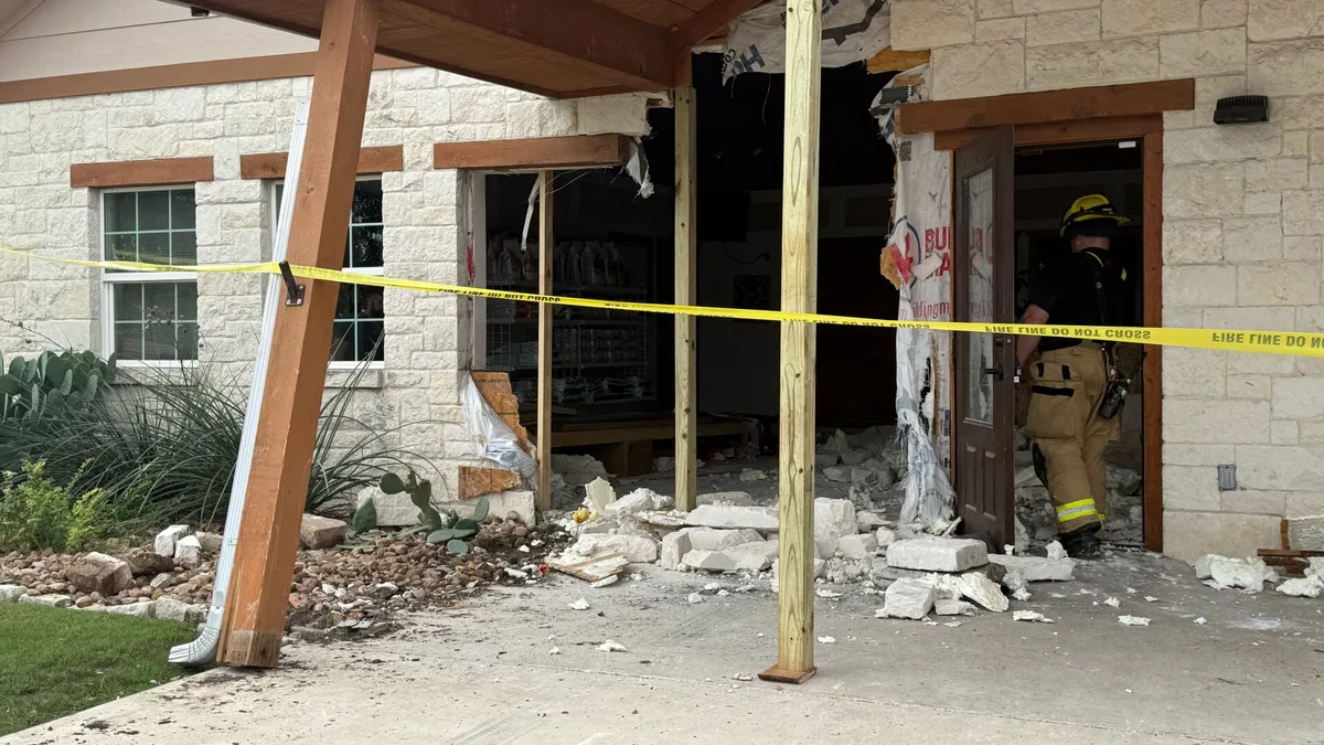 Truck collides with vet clinic, no serious injuries reported