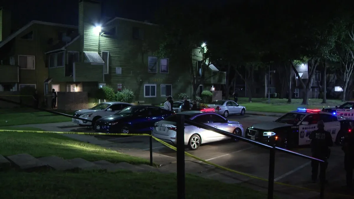 Dallas shooting: Woman killed in crossfire in courtyard of condo complex